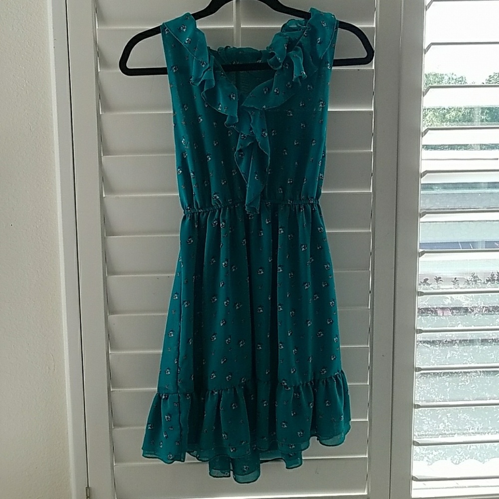 Dark turquoise vibrant green with floral print